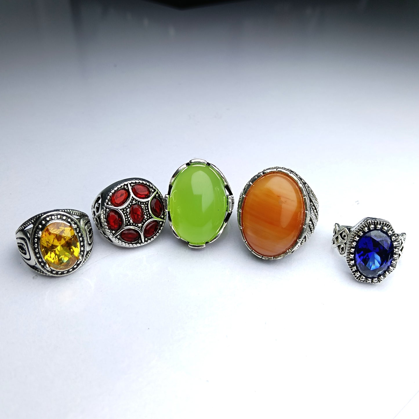 A beautiful limited time Deal of 5 gemstone Rings – nellum, Yellow zircon, ruby, yammni aqeeq & Green Stones ring